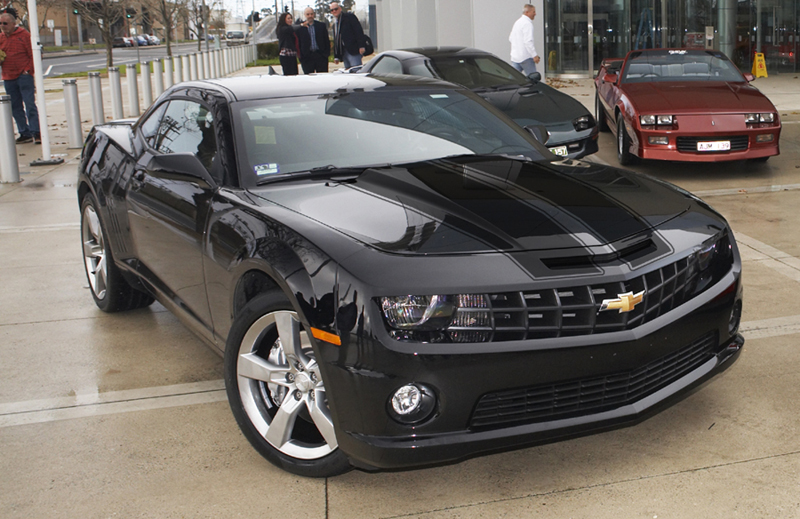 yellow camaro with black racing stripes